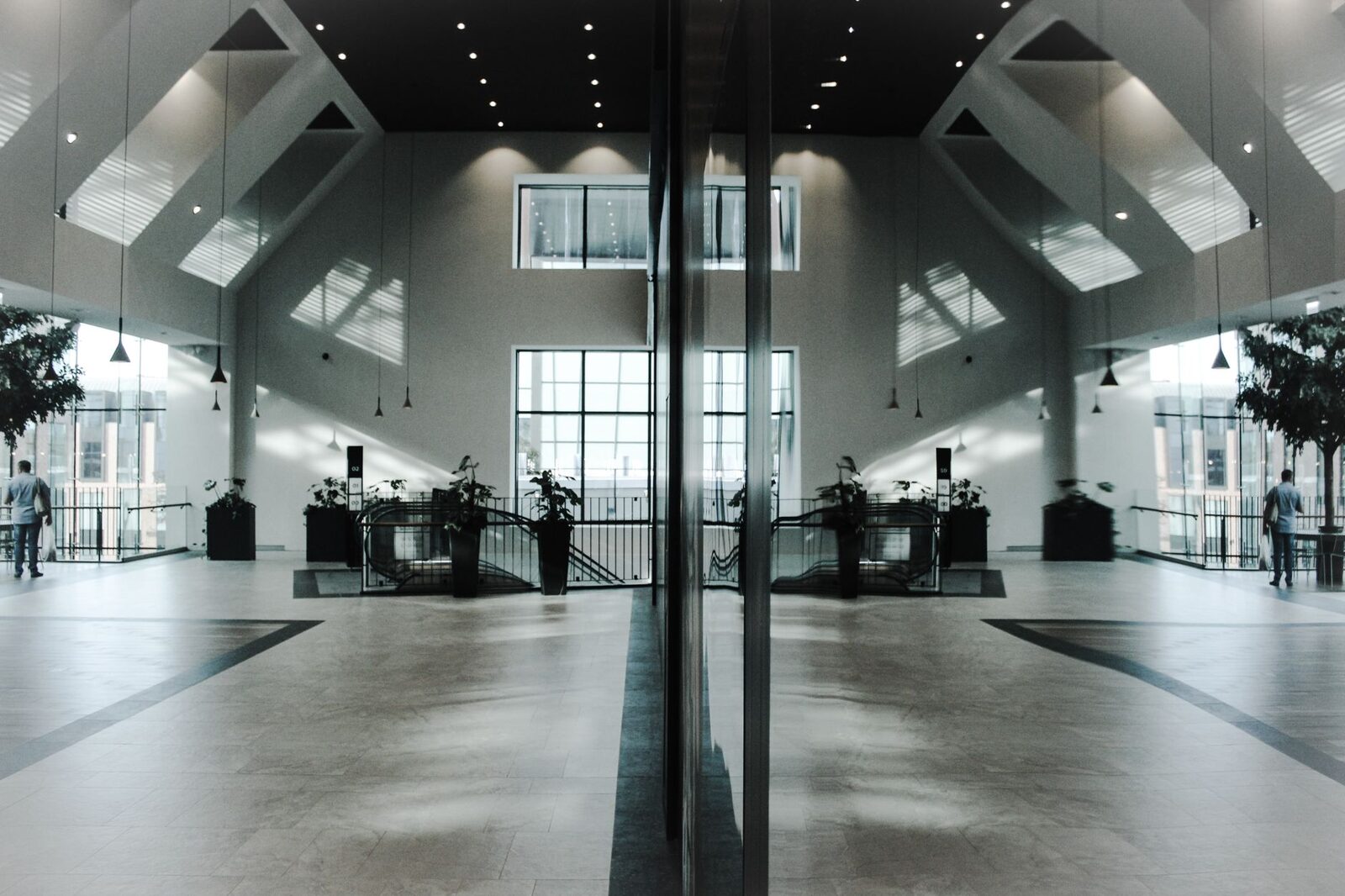 Large commercial atrium lobby with glass and steel