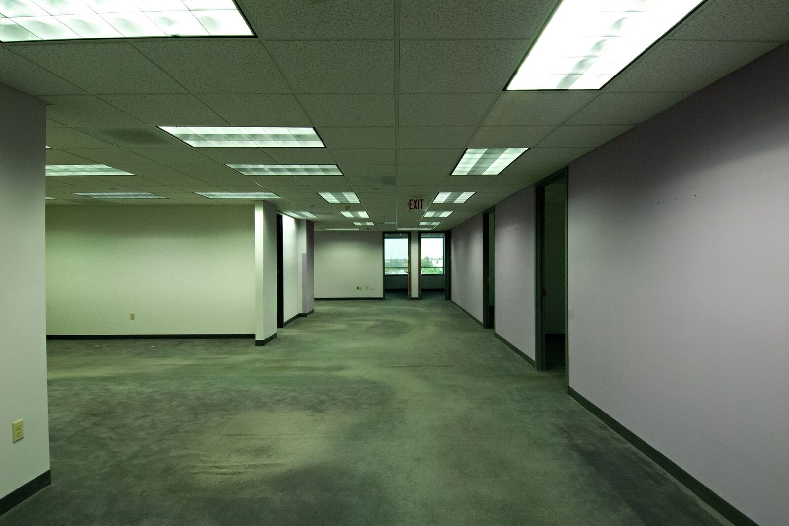 Dated empty office space before renovation