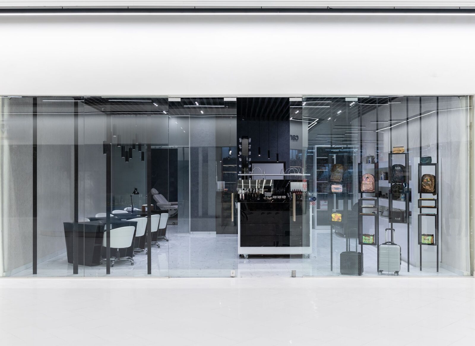 Glass-front retail store interior with finished fixtures